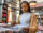 Young woman shopping in a records store